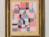 a painting on a wall with a gold frame and a pink and blue abstract design