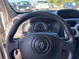 dashboard of a car with a steering wheel and dashboard gauges