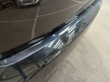 a close up of a car ' s front bumper