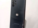 the back of a black samsung s9 with a camera attached to it