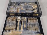 a case with silverware inside of it on a table