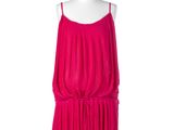 the pink dress is on a mannequin stand on a white background