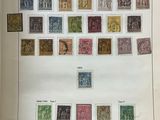 an open book with a bunch of different stamps on it