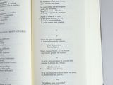 a open book with french text on it on a table