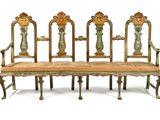four chairs that are sitting next to each other