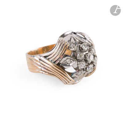 a close up of a ring with diamonds on a white background