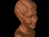 an image of a clay bust of a woman