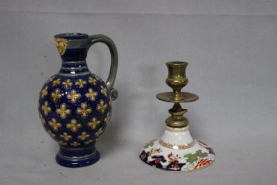 two vases sitting next to each other on a table