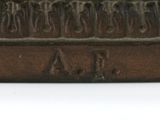 a close up of a bronze statue of a horse