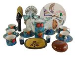 a picture of a collection of dishes and cups and saucers