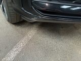a car that is parked on the side of the street