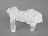 a clear plastic animal that is sitting on a table