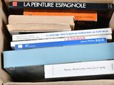 a box full of books sitting on a table