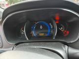 a car dashboard with a speedometer and gauges