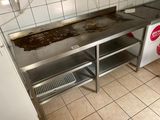an image of a dirty kitchen with a dirty counter top
