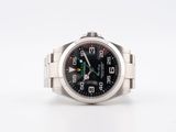 an image of a stainless steel wrist watch with a black dial
