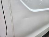 a close up of a car door handle and the door handle of the car