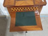 a wooden table with a chess board on top of it