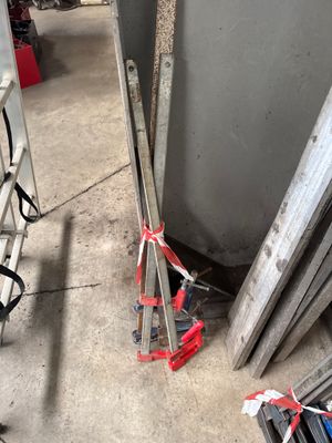 two ladders that are sitting next to each other