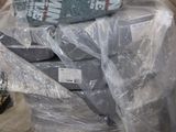 a pile of plastic bags sitting on top of a pallet