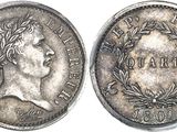 a silver coin with the head of a woman in a wreathed wreath