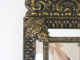 a mirror that is sitting on the wall in the room
