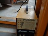 a machine that is sitting on a pallet in a warehouse