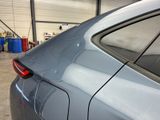 a car that is parked inside of a garage