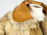 an image of a fur coat on a mannequin