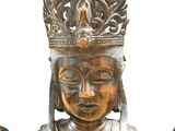 a statue of a woman with a crown on her head