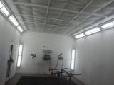 an image of a room that has a lot of white paint on the walls