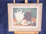 a picture of a painting on a easel with a bowl of fruit on the table