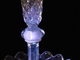 an image of a glass vase on a plate