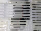 many different types of dental instruments in this case