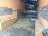 an image of the inside of a truck with the door open