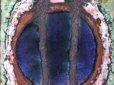 a close up of a tile with a circular design on it