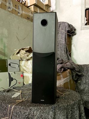 a speaker that is sitting on top of a table