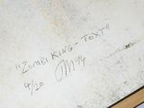 a picture of a picture of someone writing on a piece of paper