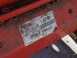 a sticker on the back of a red truck