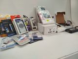 a lot of electronic items on the counter in the room