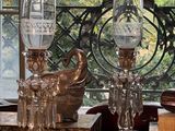 a table with a lot of antique items on it