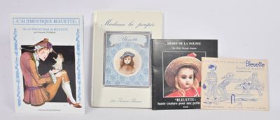 three books are lined up on a white surface one is of a woman and the other is of a man
