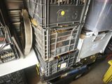 many crates stacked on top of each other in a room