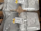 two bags of food sitting on top of a pallet