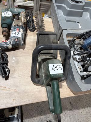 many tools on a table with a price tag on it