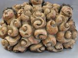 a sculpture of a group of people made out of clay
