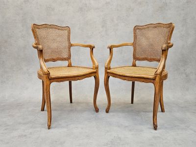 paire de chaises anciennes à dossier et accoudoirs en rotin