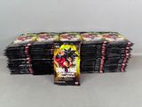a pile of dragon ball trading cards sitting on top of each other
