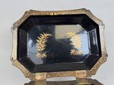 a black and gold tray with a pineapple design on it