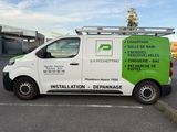 a van that is parked in the parking lot